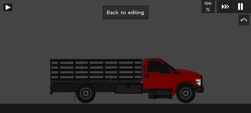 A 2000 F 350 stake bed red truck